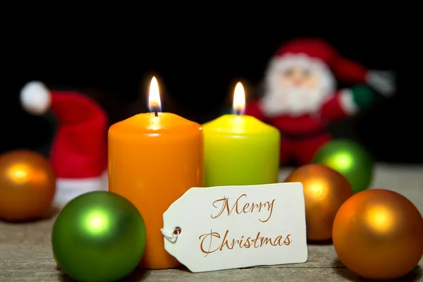 Velas de Navidad, bolas, tarjeta, Feliz Navidad — Foto de Stock