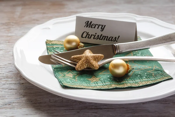 Christmas place setting, plate with napkin, knive and fork — Stock Photo, Image
