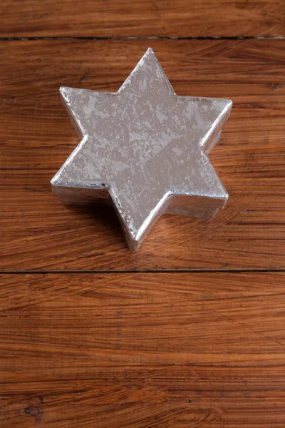 Silver star on wood, copy space — Stock Photo, Image