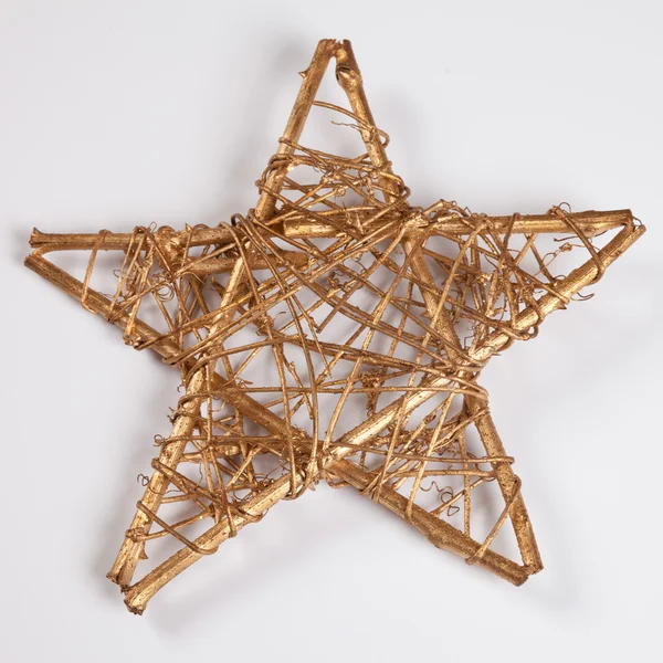 Estrela dourada, fundo branco — Fotografia de Stock