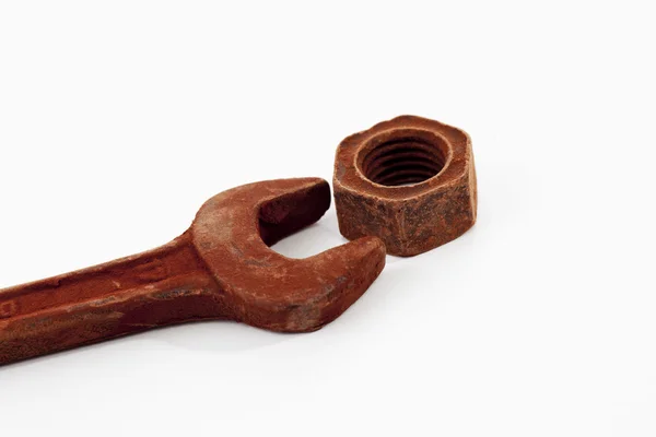 Rusty wrench and nut — Stock Photo, Image