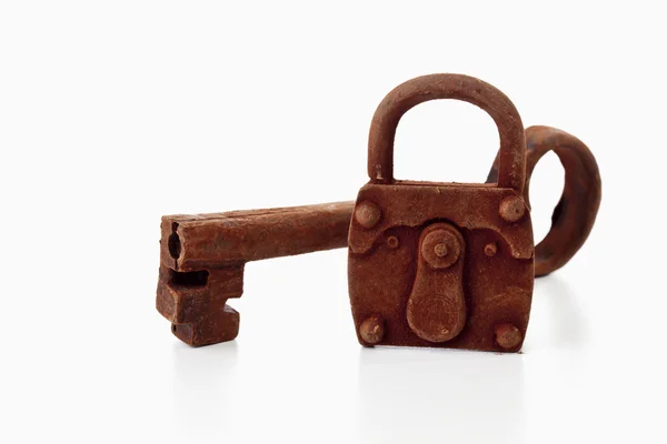 Rusty padlock and matching key — Stock Photo, Image