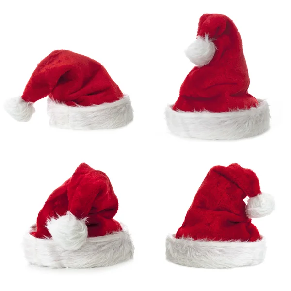 Vier santa Claus hoeden — Stockfoto