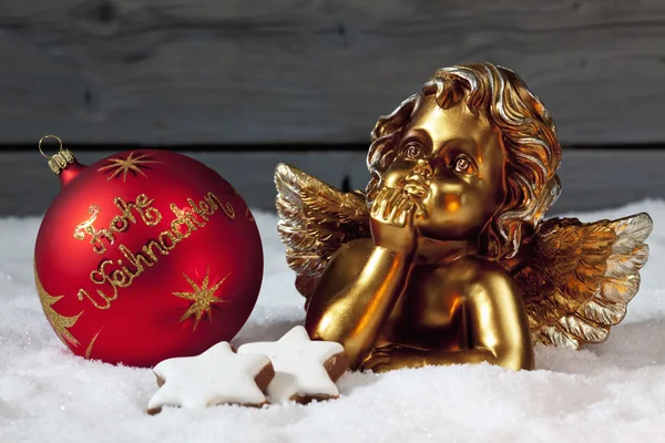 Jul-lampa och gyllene putto — Stockfoto