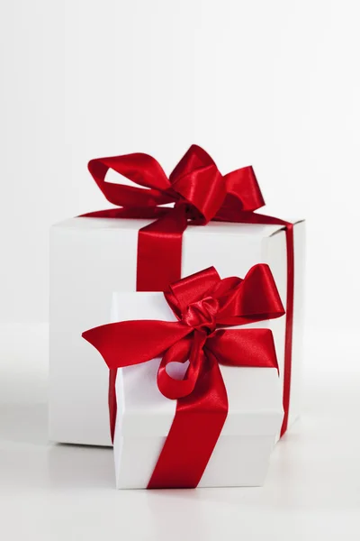 Christmas presents with red bows — Stock Photo, Image