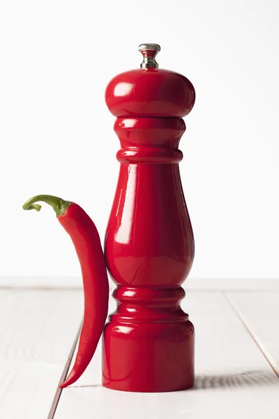 Piros chili paprika grinder — Stock Fotó