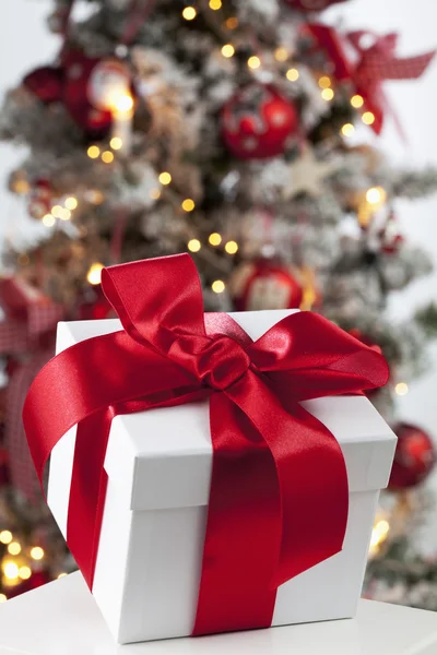 Christmas present with red bow Stock Photo