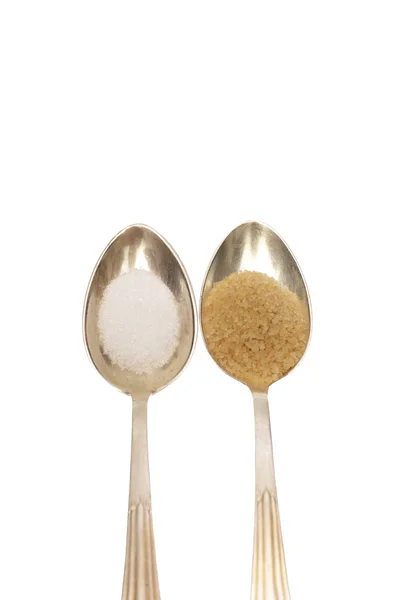 Spoons with different sugar — Stock Photo, Image