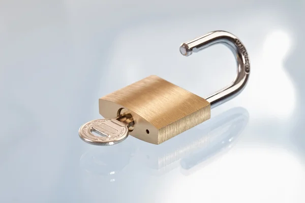 Key in padlock, close-up — Stock Photo, Image