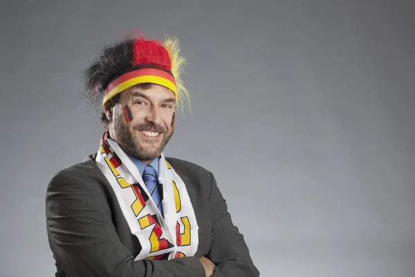 Businessman as german soccer fan — Stock Photo, Image