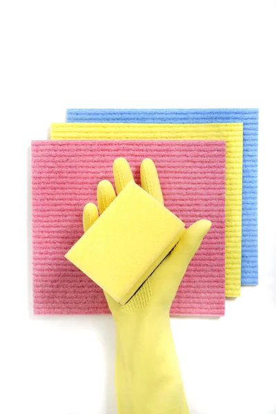 Hand wearing rubber glove holding sponge, close up — Stock Photo, Image