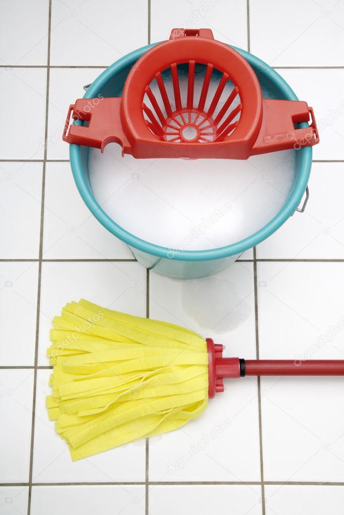 Cleaning utensils, Mop and bucket — Stock Photo © TunedIn61 85075540
