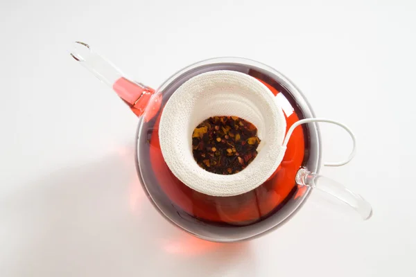 Teapot with tea strainer — Stock Photo, Image