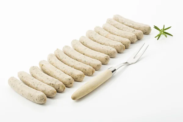 Salsichas grelhadas Nuremberg com garfo — Fotografia de Stock