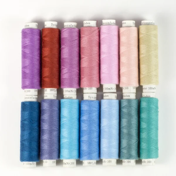 Bobbins with colorful thread — Stock Photo, Image