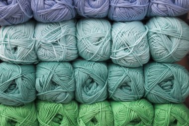 Stacked balls of colorful wools clipart