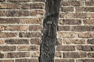 wall with bricks and wooden beam clipart