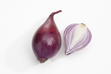 Whole and sliced spanish onions clipart
