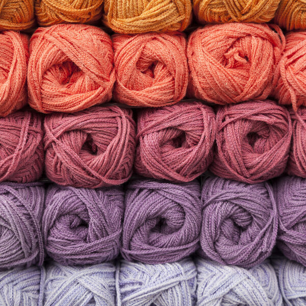 Stacked balls of colorful wools