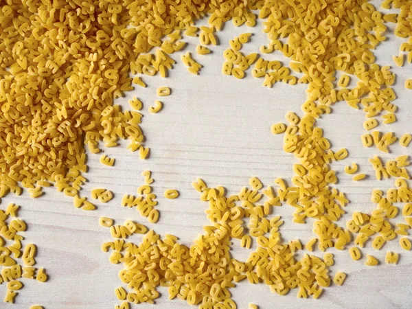 Variety yellow alphabet noodles — Stock Photo, Image