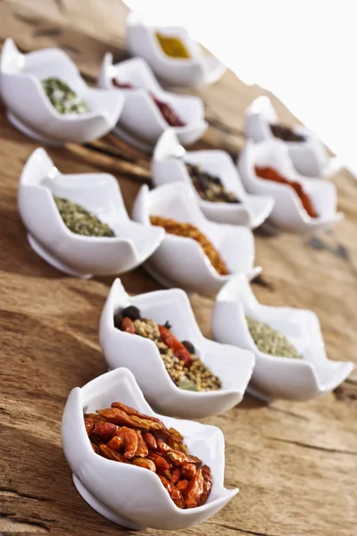 Different spices in bowls — Stock Photo, Image