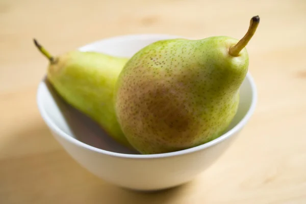 Fresh pears on plate — Stock Photo, Image