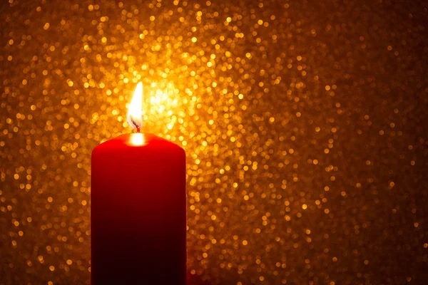 Burning red candle — Stock Photo, Image