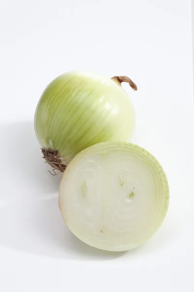 Whole and sliced spanish onions