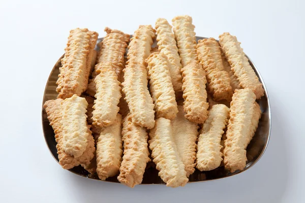 Plate with spritz biscuit — Stock Photo, Image