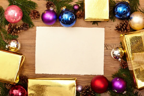 Christmas presents and blank card — Stock Photo, Image