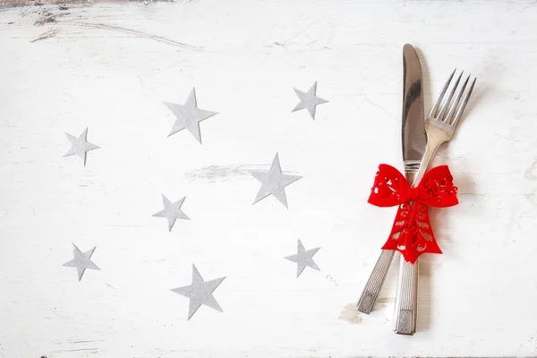 Decorated with red bow cutlery — Stock Photo, Image
