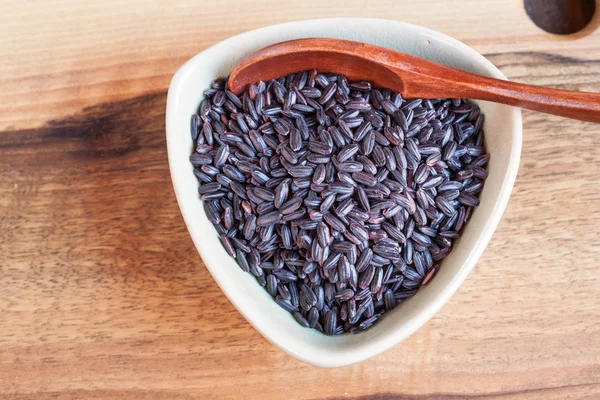 Black wholemeal rice in bowl — Stock Photo, Image