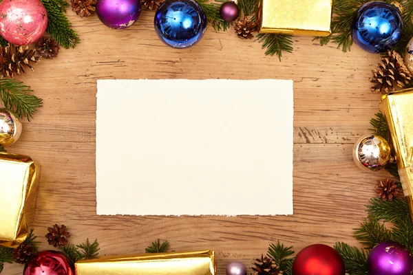 Christmas presents and blank card — Stock Photo, Image