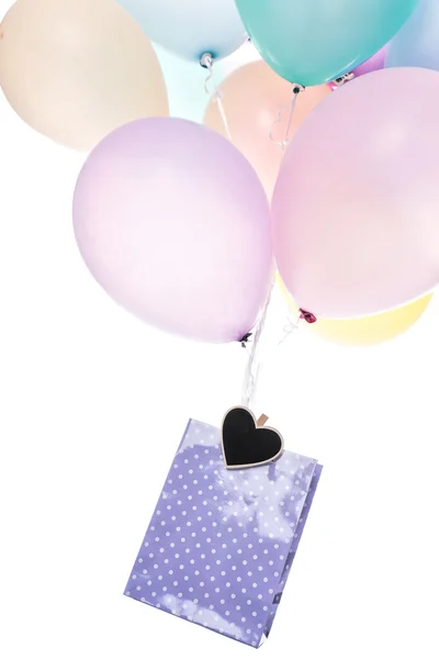 Palloncini colorati con borsa e cuore — Foto Stock