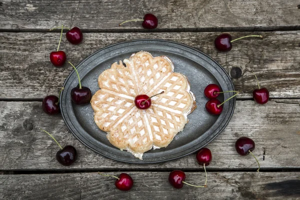 Waffle with cherries and cream — Stock Photo, Image