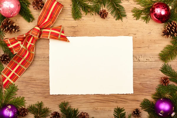 Fir twigs and blank card Royalty Free Stock Images