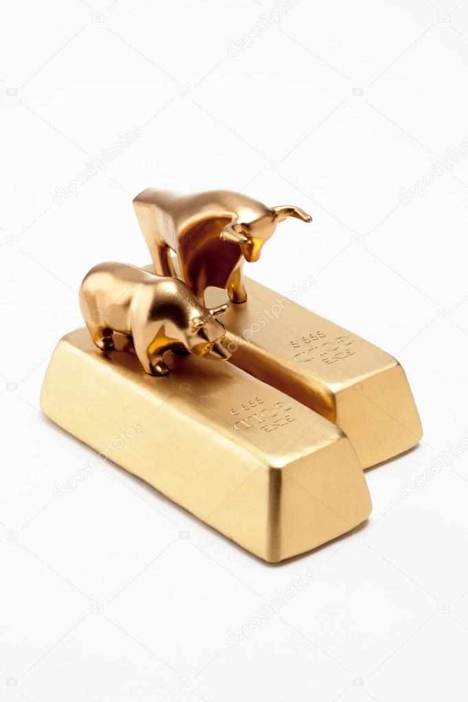 Golden bull and bear figurines