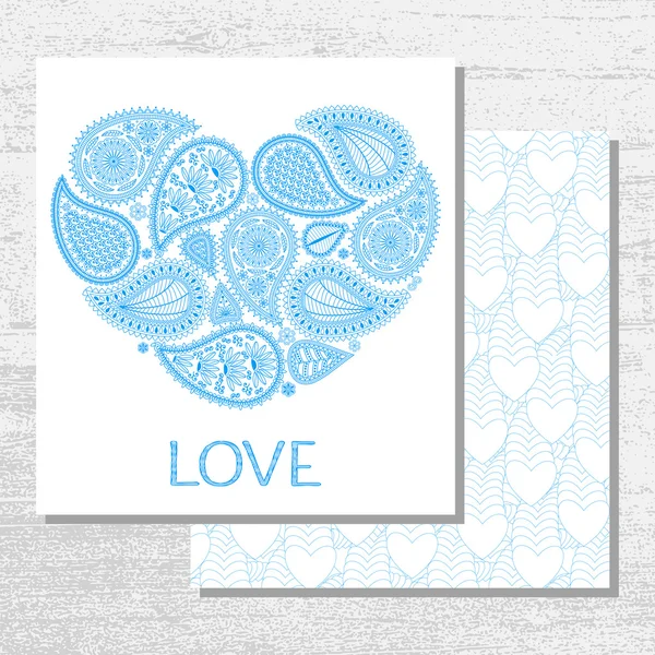 Floral paisley background with ethnic ornament and heart shape. Romantic design in blue colors and text Love. Greeting card. Vector illustration. — Stok Vektör