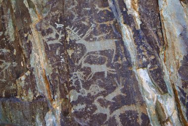 Petroglyphs rock carvings clipart