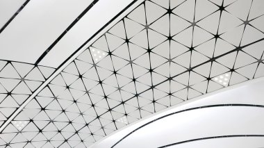 White interior ceiling design triangle pattern background