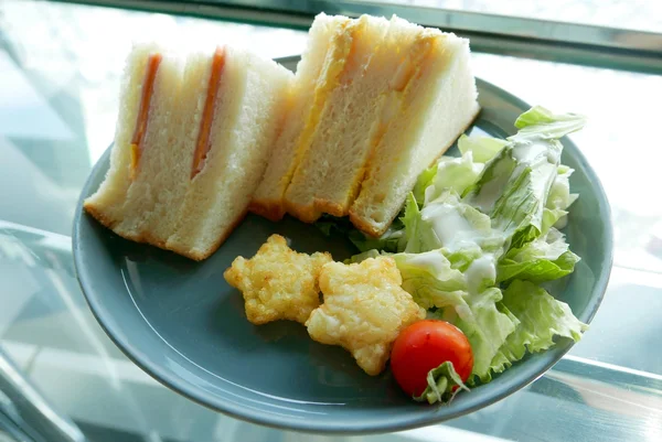 Sandwishes, potato and salad breakfast — Stock Photo, Image