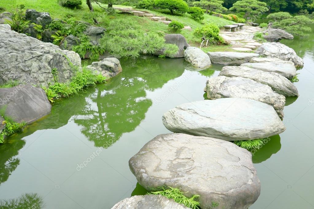 stone bridge and water pond in japanese zen garden stock photo 113776410 - Japanese Garden Stone Bridge stone bridge and water pond in japanese zen garden stock photo 113776410 - Japanese Garden Stone Bridge