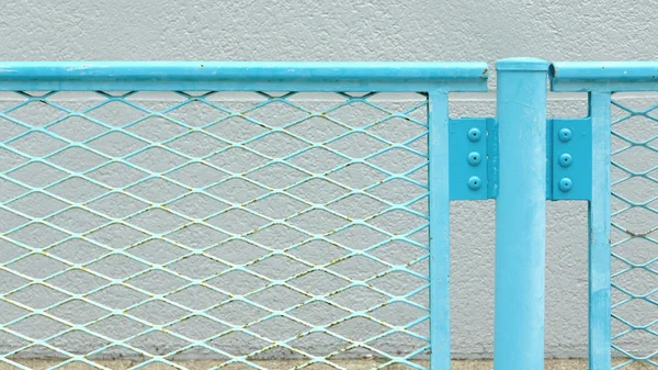 Blue metal chainlink fence — Stock Photo, Image