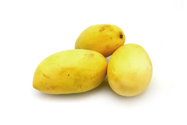 Tres mangos amarillos —  Fotos de Stock