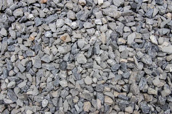 Tle czarno-biały kamień na ziemi — Zdjęcie stockowe