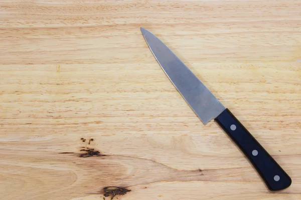 Knife on the cutting board — Stock Photo, Image