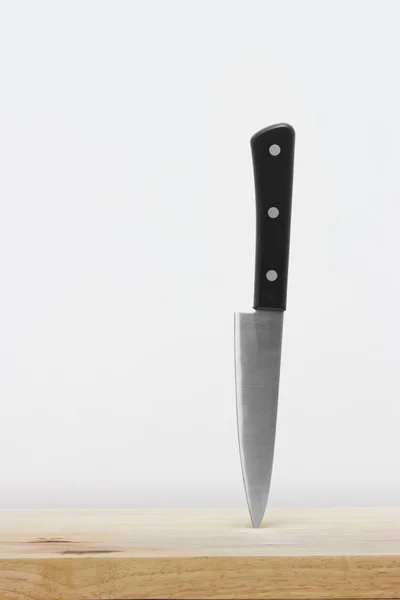 Knife on the cutting board — Stock Photo, Image