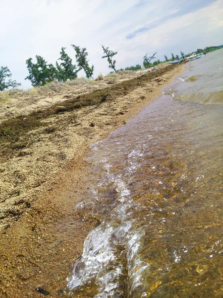 Areia dourada e ondas — Fotografia de Stock