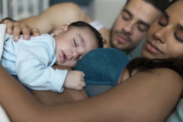 Lovely family lie in — Stock Photo, Image