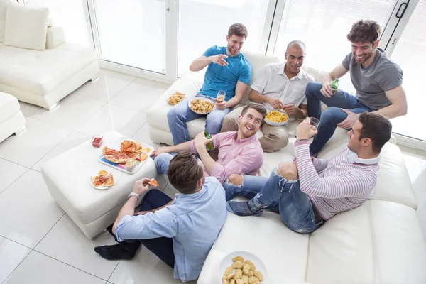 Men Enjoying Pizza And Beer